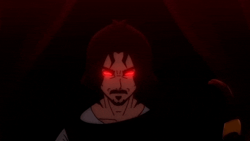 a man with red eyes and a beard looks angry