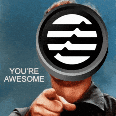 a man pointing at the camera with the words " you 're awesome " behind him