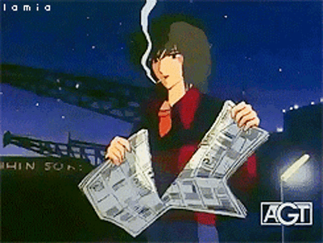 a man is reading a newspaper with the word agt on the bottom right