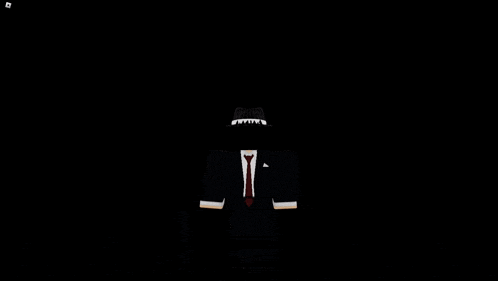 a man in a suit and hat is standing in the dark with a black background .