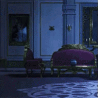 a man and a woman are standing next to each other holding hands in a room .