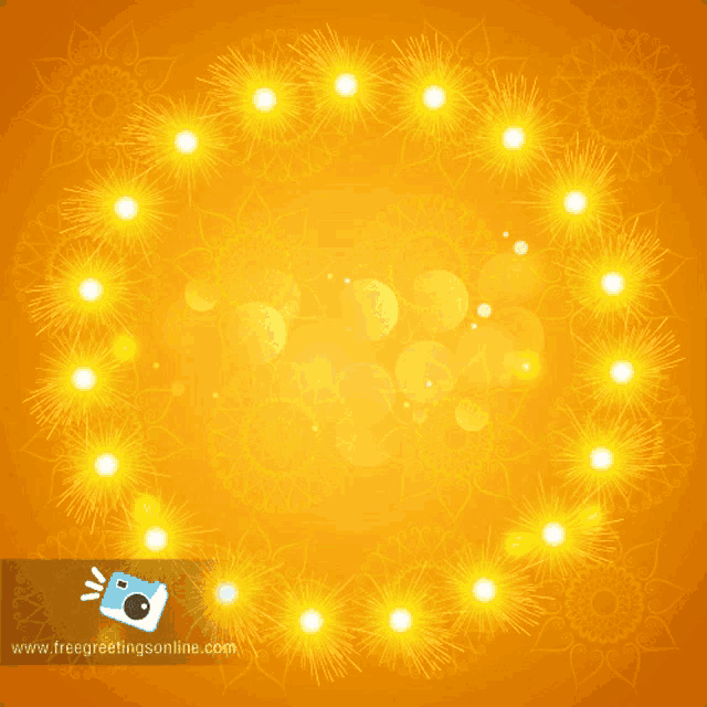 three lit candles are surrounded by fireworks and the website www.freegreetingsonline.com is below the candles