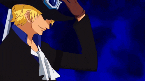 a man wearing a hat and goggles is smiling