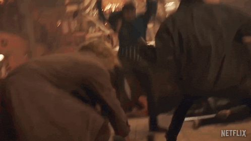 a group of people are dancing in a bar with a netflix logo on the bottom of the screen .