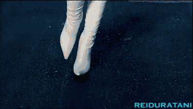 a pixelated image of a woman with the word reiduratani on the bottom right