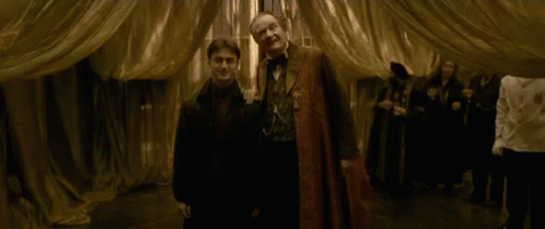 When Your Family Wants To Take Pictures GIF - Harry Potter Daniel Radcliffe Professor Slughorn GIFs