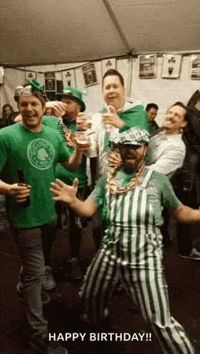 a group of men are celebrating st. patrick 's day in a tent