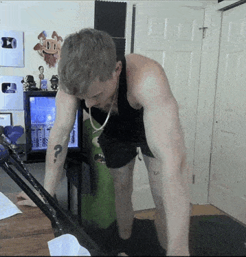 a man with a tattoo on his arm that says " a "