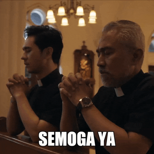 two priests are praying in a church and the caption says " semoga ya "