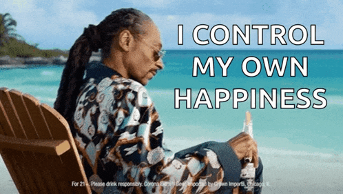a man sits in a chair on the beach with the words " i control my own happiness " behind him