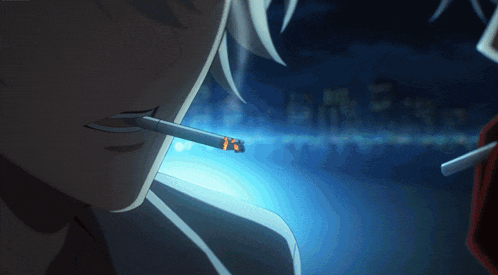 a person is smoking a cigarette with a blue background