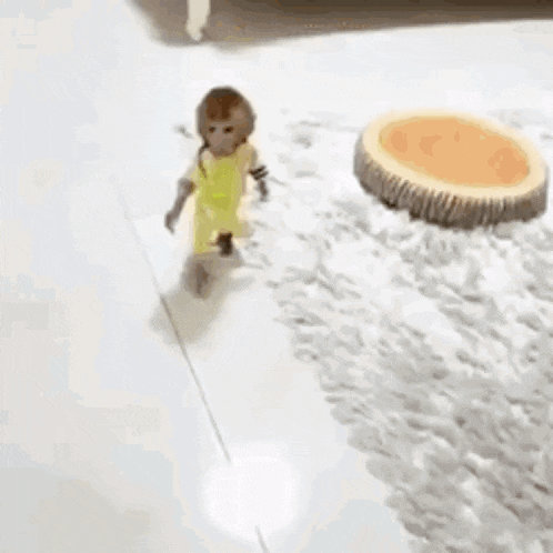 a small monkey is walking down a staircase .