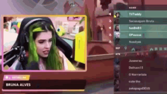 a girl with green hair is playing a video game