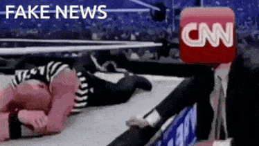 a cartoon of a woman laying on the ground with a cnn logo in the background