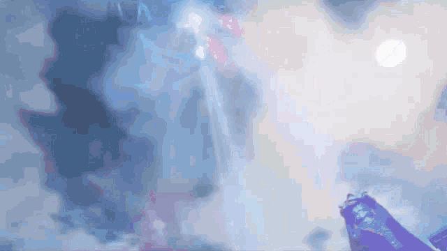 a person is holding a gun in front of a blue and white background