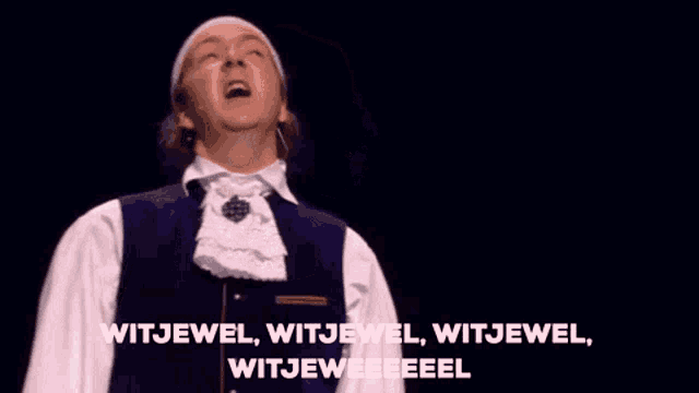 a man in a blue vest and white shirt says witjewel witjewel witjewel witjeweweeel