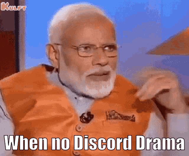 a man with a beard and glasses is wearing an orange vest and says when no discord drama .