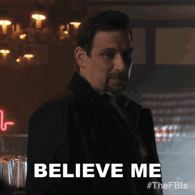 a man says " believe me " in a dark room