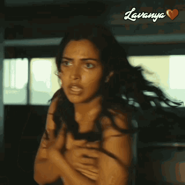 a naked woman with lavanya written on the bottom of the image