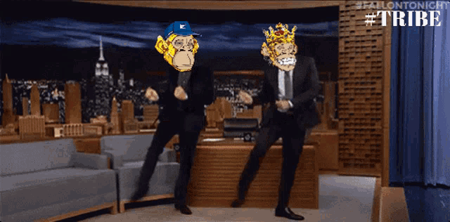 two men in suits are dancing in front of a curtain that says tribe