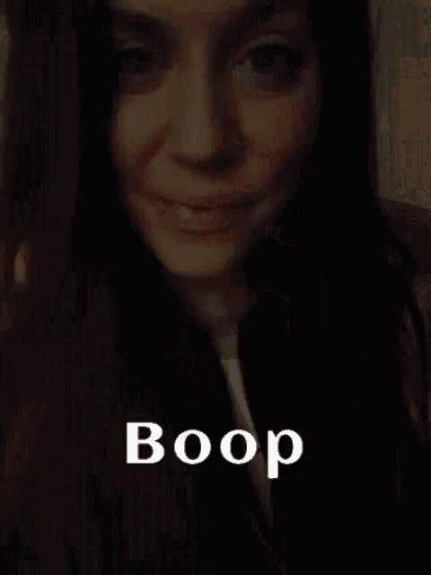 a woman 's face is shown with the word boop written below it