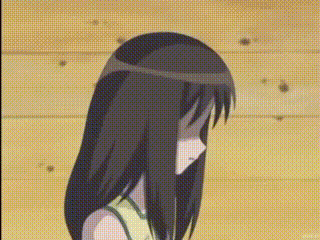 a girl with long black hair is standing in front of a wooden wall and covering her face .