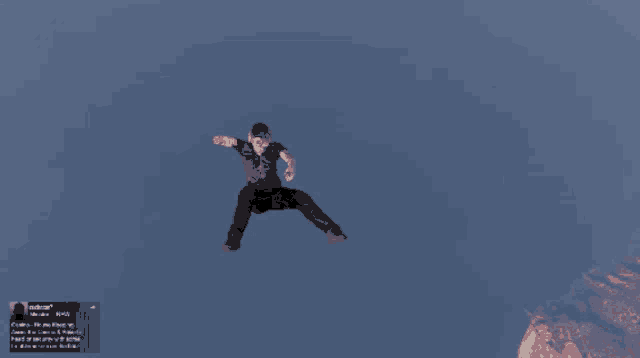 a person is flying through the air with a blue sky behind them
