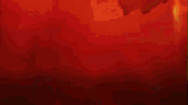 a close up of a person 's face with a red background and white lines