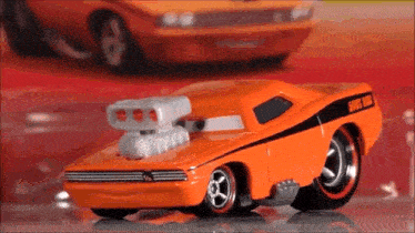 a hot wheels car with a big exhaust pipe on it