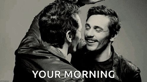 two men are hugging each other in a black and white photo with the words `` your morning '' .