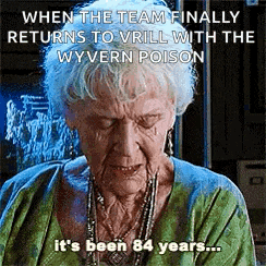 an elderly woman in a green sweater is crying .
