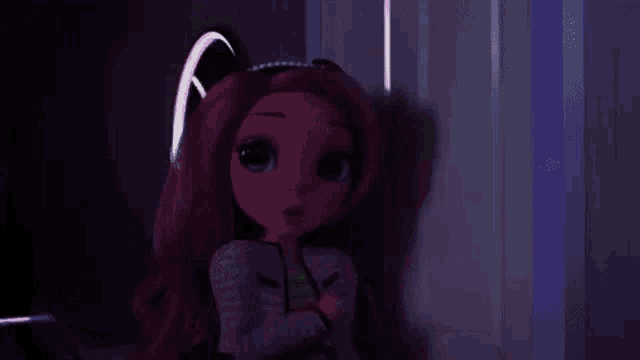 a doll with pink hair is standing in a dark room with a purple light behind her .