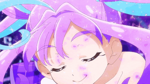a girl with purple hair and blue ribbons is smiling with her eyes closed