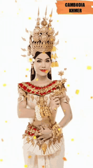 a woman in a costume from cambodia with a crown on her head