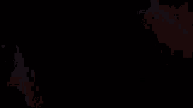 a close up of a flame with a black background