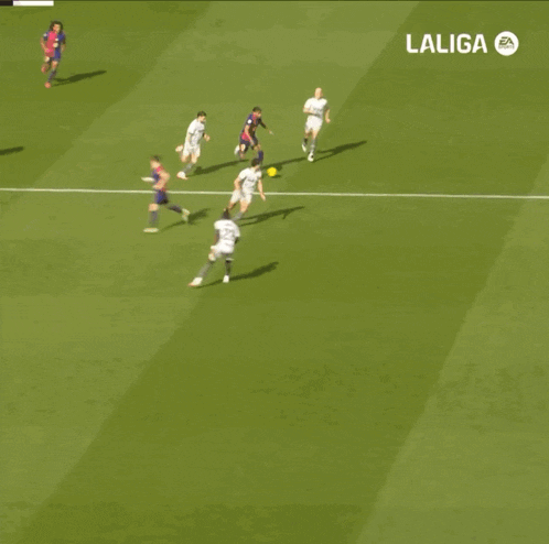 a soccer game is being played on a field that says laliga on it