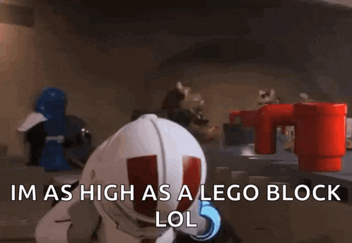 a lego character with a helmet on his head says i 'm as high as a lego block lol