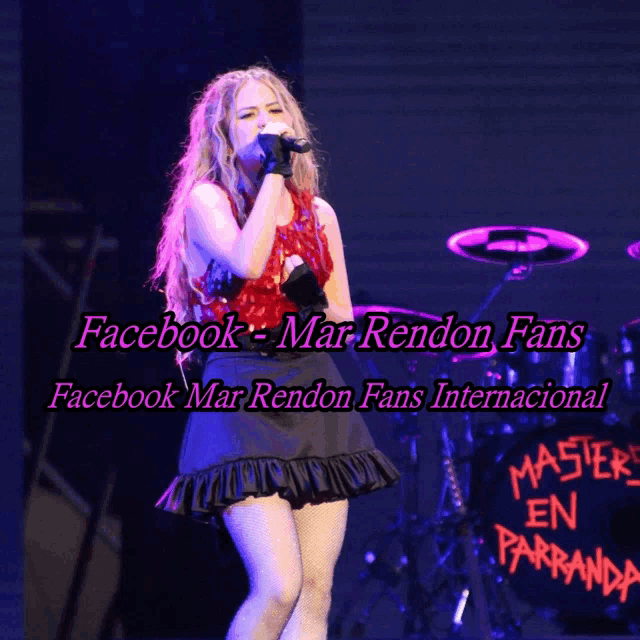 a woman singing into a microphone with the words facebook mar rendon fans behind her