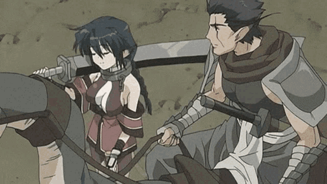 a man and a woman are standing next to each other .