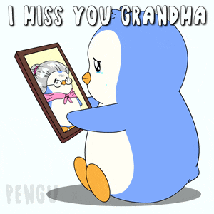 a penguin is looking at a picture of an older woman and says i miss you grandma