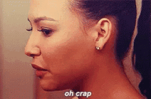 a close up of a woman 's face and neck with the words `` oh crap '' written on it .