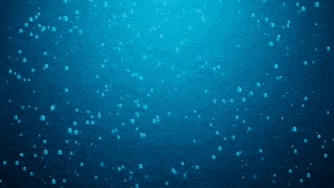 a blue background with bubbles in the water