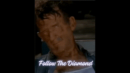 a close up of a man 's face with the words follow the diamond written below him