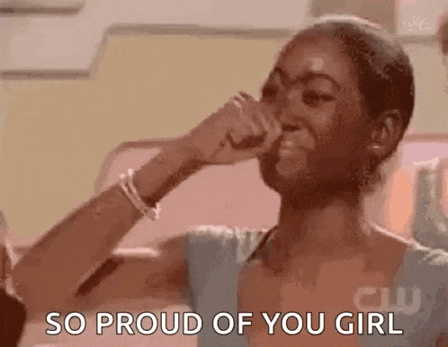 a woman is covering her nose with her hand while a man says `` so proud of you girl '' .