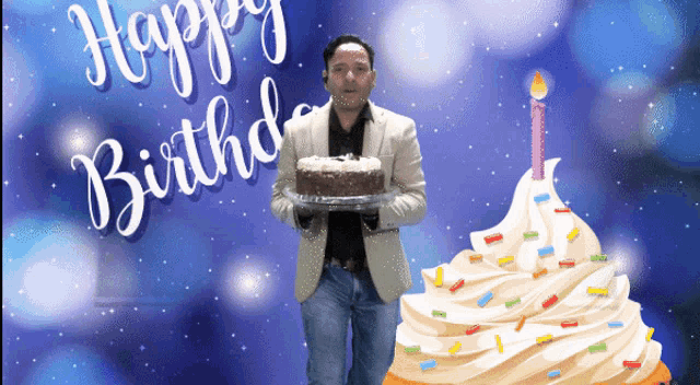 a man holding a cake in front of a birthday cake with a candle