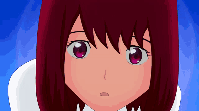 a close up of a girl 's face with red hair