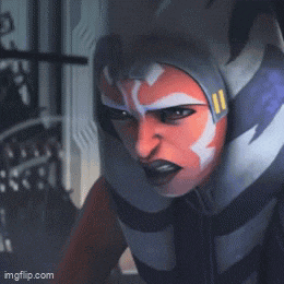 a close up of ahsoka tano from star wars with a angry look on her face