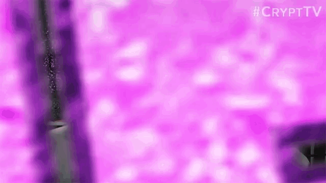 a close up of a purple background with a blurred image of a person 's face .