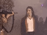 Lobotomiesrus Michael Jackson Lowering Gun GIF - Lobotomiesrus Michael Jackson Lowering Gun GIFs
