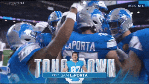 a group of football players huddled together with the name sam laporta on the top